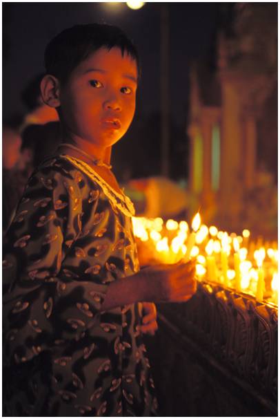 child with a candle