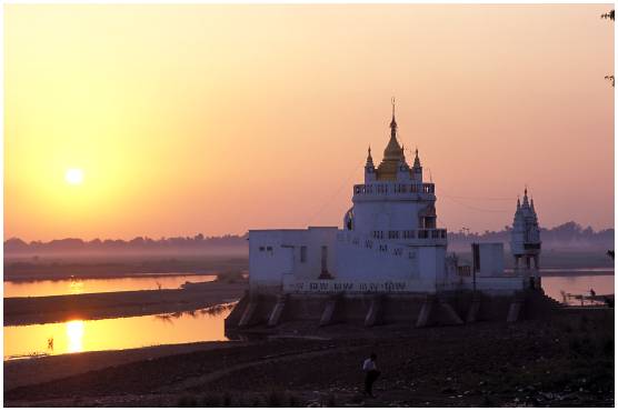 Sunset on a pagoda in Amarapura view from the U Bein bridge