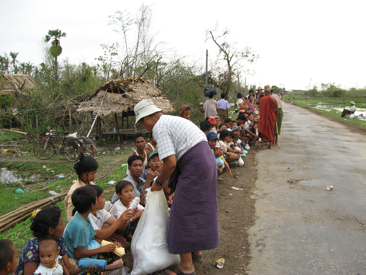 food distribution with a buddhist monk