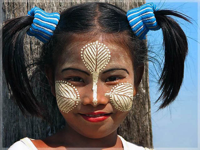 Myanmar Girl with a very nice tanaka make up at U Bein brigde near Mandalay